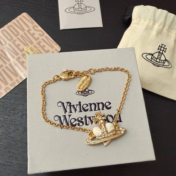 Vivienne Westwood Jewelry - Vivienne Westwood Gold and Silver Orb Bracelet
